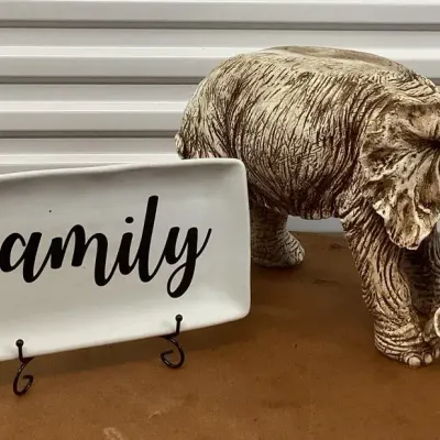  Plastic Elephant And A Ceramic Platter Wit Stand 