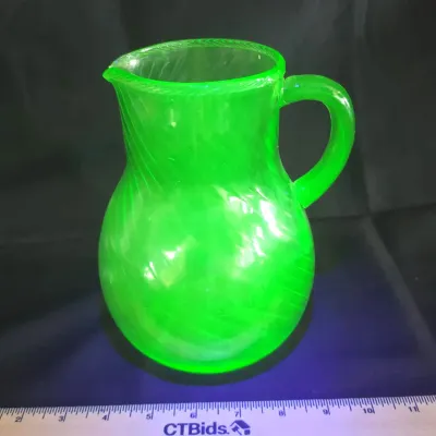 Sale Photo Thumbnail #17: Uranium Glass Swirling Pitcher 7.5" Tall