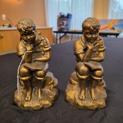 Brass child bookends