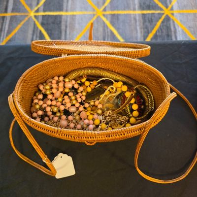 Woven bag with jewelry 