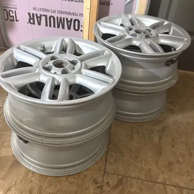 4 Mini Cooper wheels 16x6.5 - upstairs 