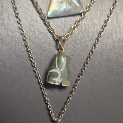 Sale Photo Thumbnail #58: All Natural Stone Necklaces & Accessories [set 5]
> triangulate Abalone shell pendant on 16" chain
> vintage hand carved green pendant with 14" chain
> earthy banded agate w/organic textured cap on a 18" chain
> round sterling rose quartz bezel post earri