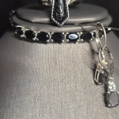 Sale Photo Thumbnail #23: Set 4 Onyx and silver Cross / Bracelet / Ring / Earrings 
all pieces have Onyx inlays, silver tone and rhodium finish.
New as found, excellent condition
Ring size 8   Earrings j-hook pierced