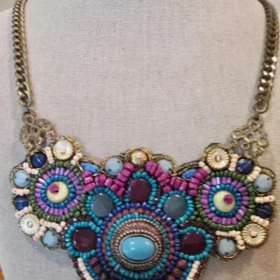 handcrafted bib necklace intricate bead embroidery metallic turquoise accent