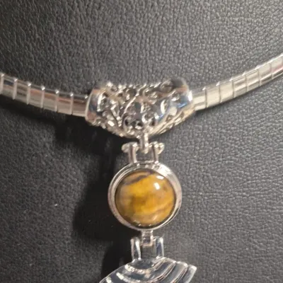 Sale Photo Thumbnail #42: Sterling tested Pendant on snake bar necklace & Sterling Earrings match
> Pendant has filigree bail and tiger eye cabochon Deco style.....test positive for sterling
> Earrings are tiger eye , marked sterling on sides
both in excellent condition