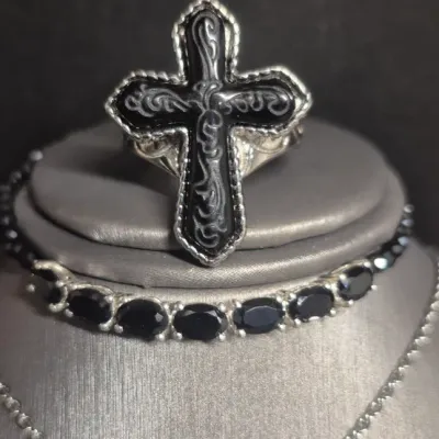 Sale Photo Thumbnail #19: Set 4 Onyx and silver Cross / Bracelet / Ring / Earrings 
all pieces have Onyx inlays, silver tone and rhodium finish.
New as found, excellent condition
Ring size 8   Earrings j-hook pierced