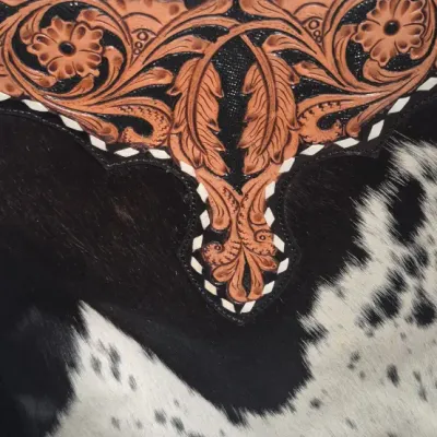 Sale Photo Thumbnail #6: Tumbleweed trail fringed had tooled Crossbody bag by MYRA BAG
Myra Hand Tooled leather Handbag Features
Premium Hairon Leather

Classy Handtooled Pattern

Convenient Phone Compartment

Zipper-close top

Trendy Fringe Accents

Myra Tooled Handbags Dimensio