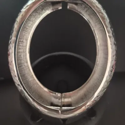 Sale Photo Thumbnail #55: Large Textured Silver Bangle
hinged, no damage or scratches.....new as found