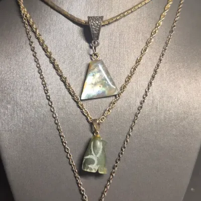 Sale Photo Thumbnail #57: All Natural Stone Necklaces & Accessories [set 5]
> triangulate Abalone shell pendant on 16" chain
> vintage hand carved green pendant with 14" chain
> earthy banded agate w/organic textured cap on a 18" chain
> round sterling rose quartz bezel post earri