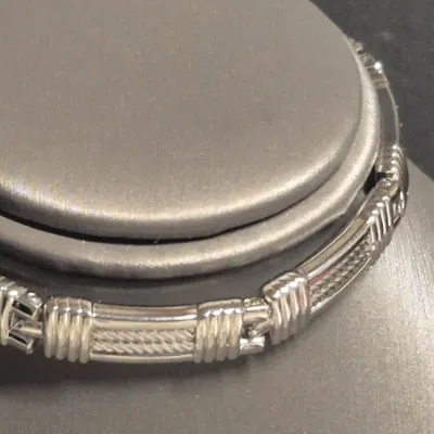 Sale Photo Thumbnail #39: Men's Silver cuff Bracelet & Woman's link chain Bracelet with bird charm
> Men's is 8" and is without scratches or damage
> Woman's link chain has a bird charm on lobster claw so it can be worn or not.
Both are new as found