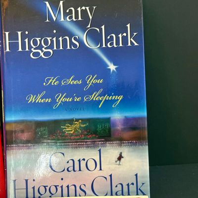 LOT 24: Holiday Novels by Mary Higgens Clark and John Grisham, Nativity Set In Original Box, Metal Church Candle Holder and More