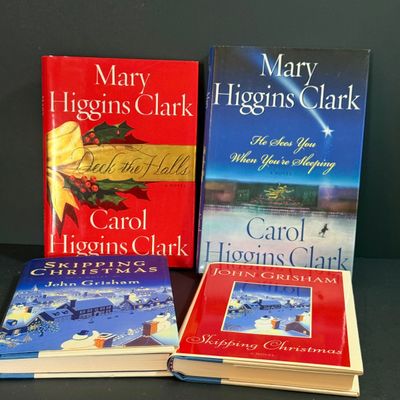 LOT 24: Holiday Novels by Mary Higgens Clark and John Grisham, Nativity Set In Original Box, Metal Church Candle Holder and More
