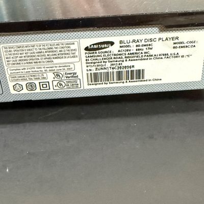 LOT 73: Samsung Blu-Ray Player BD-EM59C with a Large Selection of DVDs and 2 Blu-Rays - Including Unopened DVDs