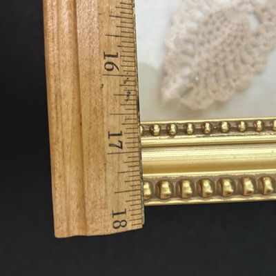 LOT 145: Handmade Crocheted Angel in a Gold Framed Display Box, Resin Sleeping Angel Shelf Sitter Sculpture, Pottery Planter & Faux...