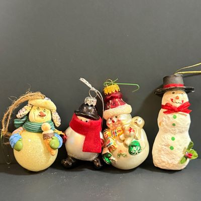 LOT 20: Collection of Festive Snowmen and Other Holiday Decor Including Painted Gourds and a Glass Frog Santa