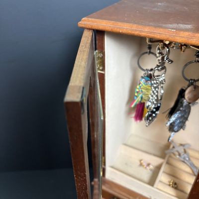 LOT 142: Jewelry Box, Sakroots Key Chains/Purse Charms & More