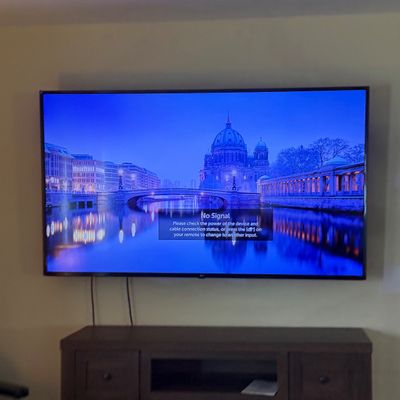 LOT 78: LG 70 TV with Remote