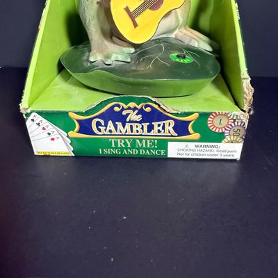 LOT 79: Vintage Dan Dee Animatronic Frog "The Gambler" in Original Box, Spidewick Childrens Book. Poker Chips, Cards and Hand...