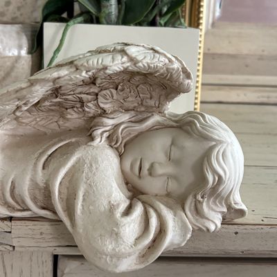 LOT 145: Handmade Crocheted Angel in a Gold Framed Display Box, Resin Sleeping Angel Shelf Sitter Sculpture, Pottery Planter & Faux...