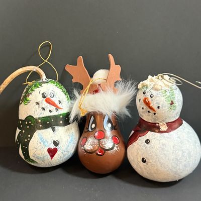 LOT 20: Collection of Festive Snowmen and Other Holiday Decor Including Painted Gourds and a Glass Frog Santa