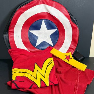 LOT 76: Marvels Captain America Shield Backpack with Wonder Woman Costume (Cape, Shirt and Headband Only)