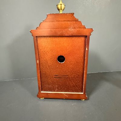 LOT: 72: Collection of Russian Style Nesting Dolls and Quartz Bombay Co Mantle Clock