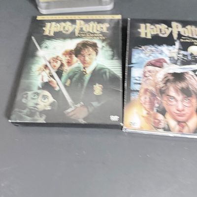 LOT 74: Collection of DVDs Including Star Trek Collector Ed, Harry Potter, War of the Worlds and More