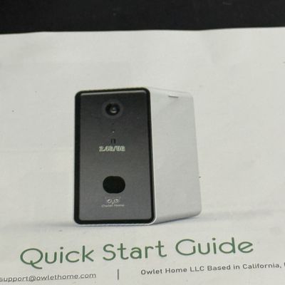 LOT 77: Owlet Home Smart Dog Camera with Treat Popper