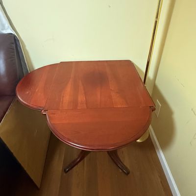 LOT 64: Wooden 4-Sided Drop Cloverleaf Pedestal Table, Floor Lamp and Floral Wall Art
