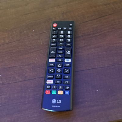 LOT 78: LG 70 TV with Remote