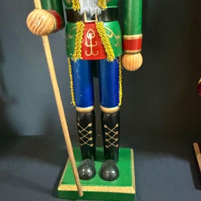 LOT 26: Collection of Wooden Nutcrackers with Other Holiday Decor - Including Santa of The World in Original Box & More