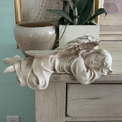 LOT 145: Handmade Crocheted Angel in a Gold Framed Display Box, Resin Sleeping Angel Shelf Sitter Sculpture, Pottery Planter & Faux...