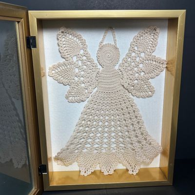 LOT 145: Handmade Crocheted Angel in a Gold Framed Display Box, Resin Sleeping Angel Shelf Sitter Sculpture, Pottery Planter & Faux...