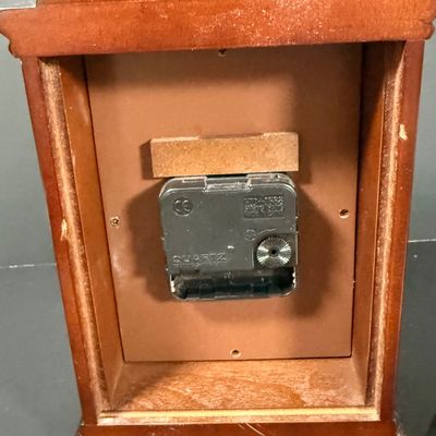LOT: 72: Collection of Russian Style Nesting Dolls and Quartz Bombay Co Mantle Clock