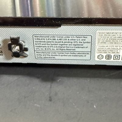 LOT 73: Samsung Blu-Ray Player BD-EM59C with a Large Selection of DVDs and 2 Blu-Rays - Including Unopened DVDs