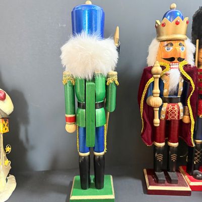 LOT 26: Collection of Wooden Nutcrackers with Other Holiday Decor - Including Santa of The World in Original Box & More