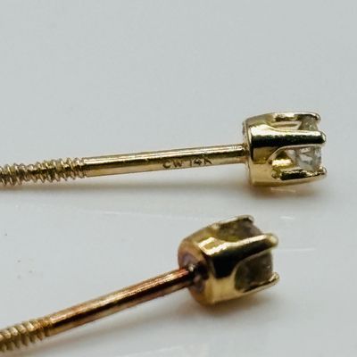 LOT 200: Petite 14K Diamond Earrings .40g Tw