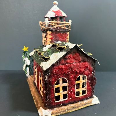 LOT 24: Holiday Novels by Mary Higgens Clark and John Grisham, Nativity Set In Original Box, Metal Church Candle Holder and More