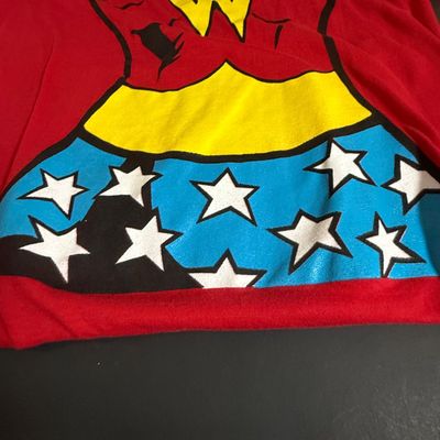 LOT 76: Marvels Captain America Shield Backpack with Wonder Woman Costume (Cape, Shirt and Headband Only)