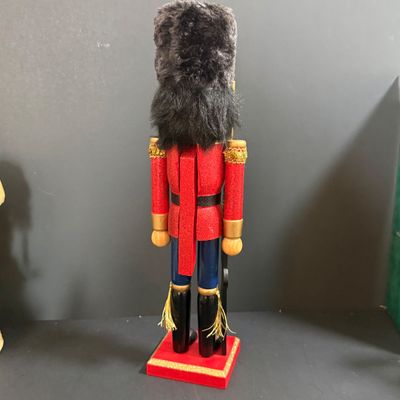 LOT 26: Collection of Wooden Nutcrackers with Other Holiday Decor - Including Santa of The World in Original Box & More