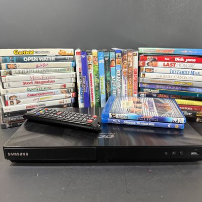 LOT 73: Samsung Blu-Ray Player BD-EM59C with a Large Selection of DVDs and 2 Blu-Rays - Including Unopened DVDs