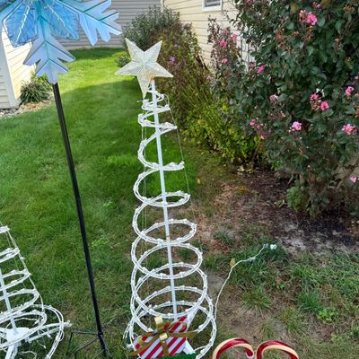 LOT 63: Assortment of Christmas Lawn Decorations Including Rope Light Christmas Trees, Candy Cane Lights. Snowflake Wind Spinner, Red...