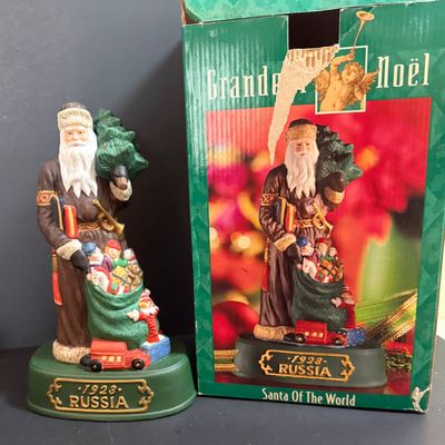 LOT 26: Collection of Wooden Nutcrackers with Other Holiday Decor - Including Santa of The World in Original Box & More