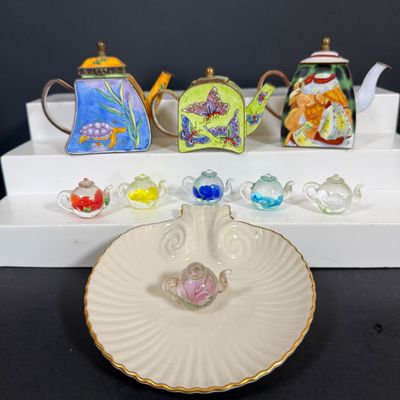 LOT 75: Collection of Miniature Enamel Teapots by Kelvin Chen, Mini Glass Flower Teapot Paperweights, Lenox Shell Shaped Dish & More