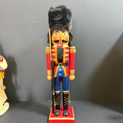LOT 26: Collection of Wooden Nutcrackers with Other Holiday Decor - Including Santa of The World in Original Box & More