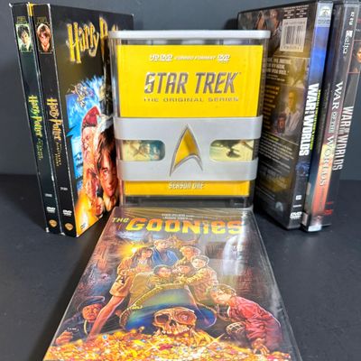 LOT 74: Collection of DVDs Including Star Trek Collector Ed, Harry Potter, War of the Worlds and More