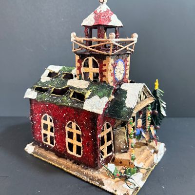 LOT 24: Holiday Novels by Mary Higgens Clark and John Grisham, Nativity Set In Original Box, Metal Church Candle Holder and More