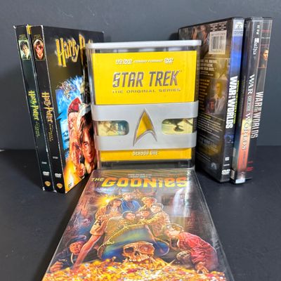LOT 74: Collection of DVDs Including Star Trek Collector Ed, Harry Potter, War of the Worlds and More