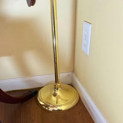 LOT 64: Wooden 4-Sided Drop Cloverleaf Pedestal Table, Floor Lamp and Floral Wall Art