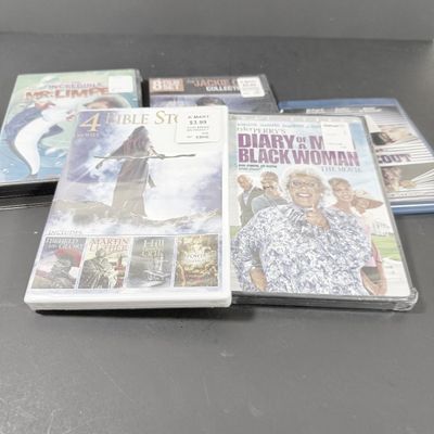 LOT 73: Samsung Blu-Ray Player BD-EM59C with a Large Selection of DVDs and 2 Blu-Rays - Including Unopened DVDs
